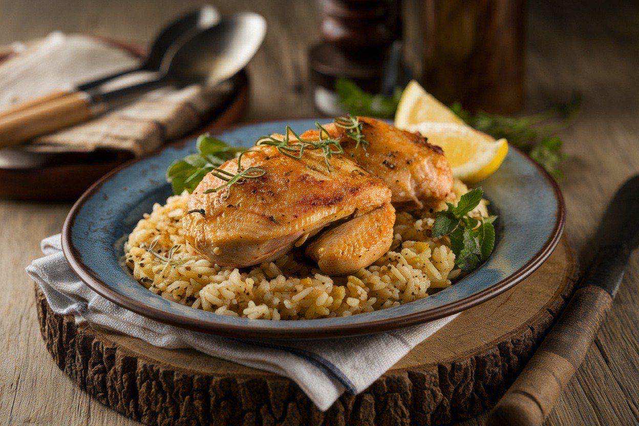 Creamy dairy-free butter chicken sauce with tender chicken pieces served over fluffy rice